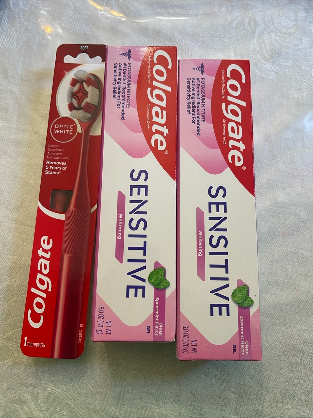 Colgate Sensitive Whitening Toothpaste & Red Colgate Toothbrush Bundle